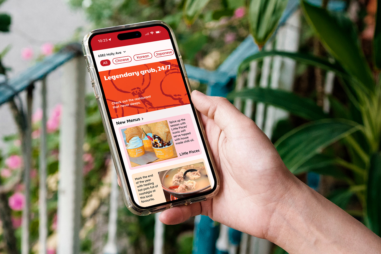 Hand holding an iPhone displaying the ARR(Association of Richmond Restaurants) home screen.